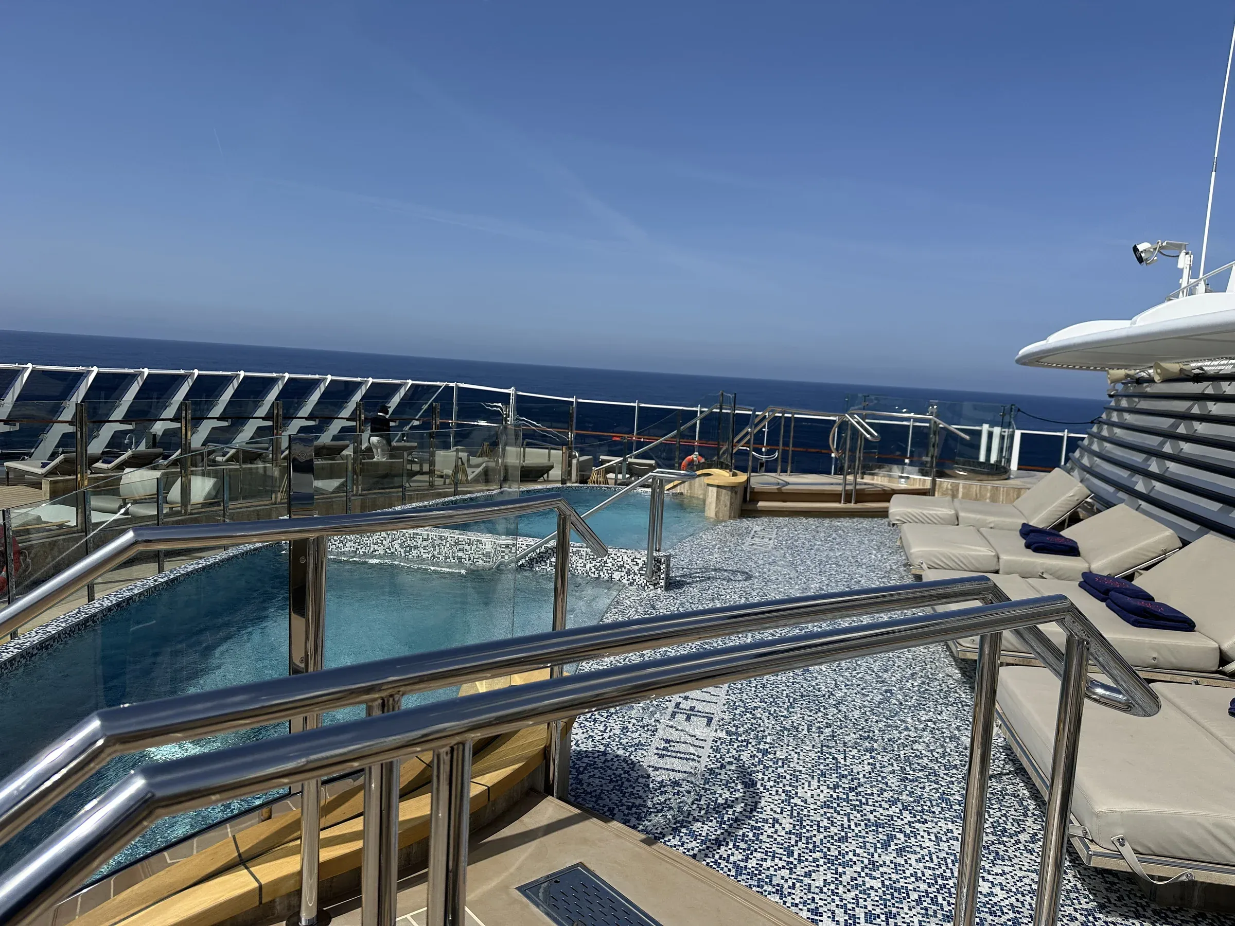 An onboard lounge aboard Explora I, looking out to the sea